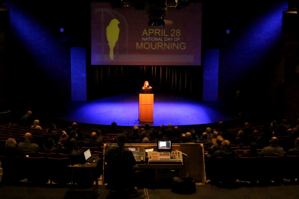 Jessica Montgomery, president of the Sudbury and District Labour Council, speaks at the 2022 Day of Mourning ceremony held at Laurentian University.