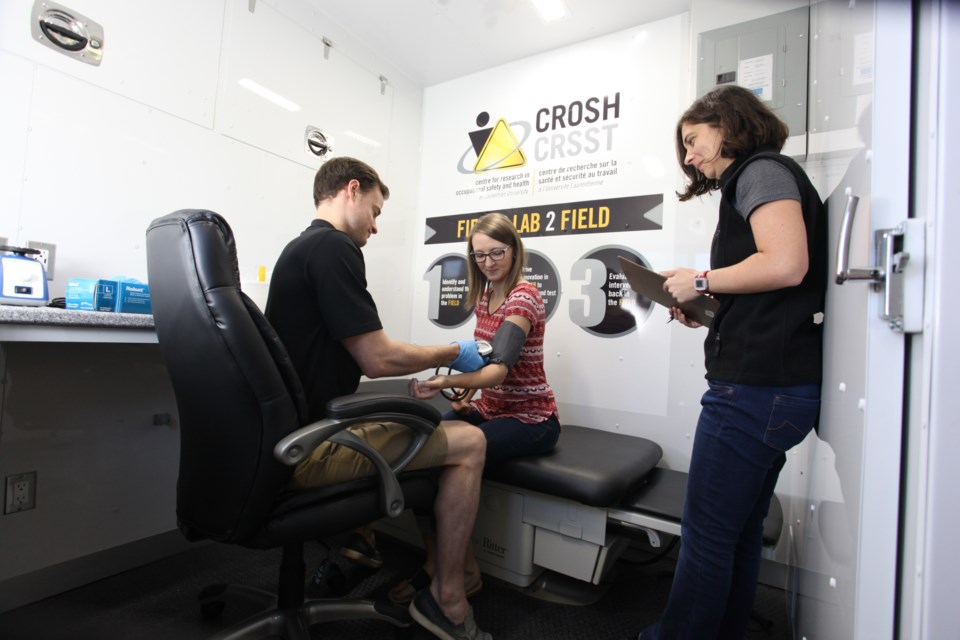 Mobile CROSH has a clinical space for researchers that look at the physiological state of workers and another area to work with participants who are using wearable technologies. There's also a small classroom space. (Handout)