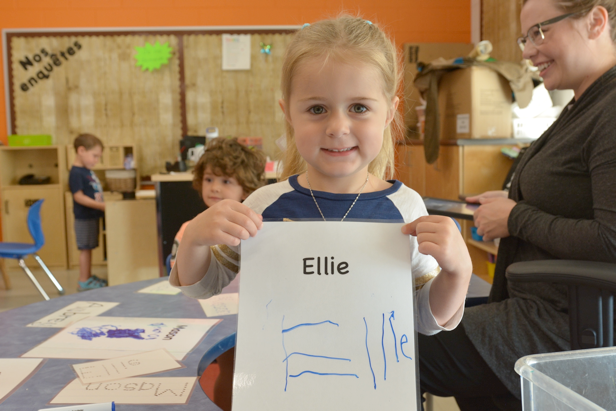 Future Kindergarten student Ellie practices writing her name alongside her classmates. (Supplied)