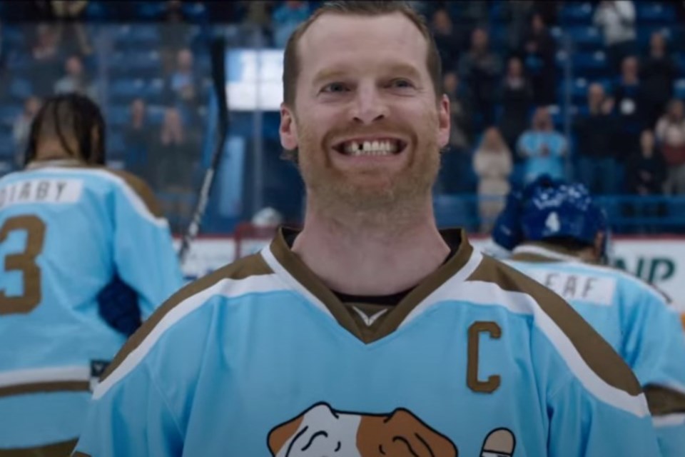 This screenshot from a teaser trailer for Shoresy Season 2 shows its title character, played by Jared Keeso, showing off his hockey player’s smile in a scene filmed at the Sudbury Community Arena.