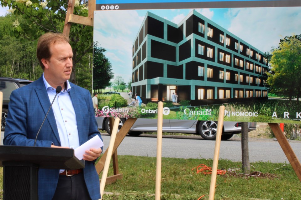 Mayor Paul Lefebvre speaks during a groundbreaking ceremony at the transitional housing complex site on Lorraine Street on Thursday.