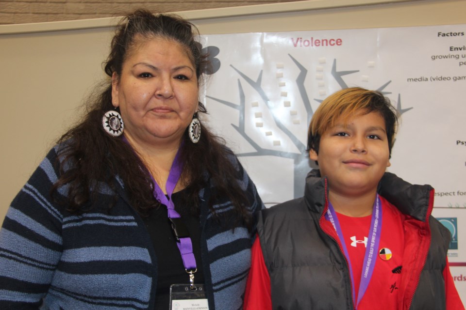 Michelle Mainville-Atkinson and her eight-year-old grandson, Xavier Aguonie Fox, were among those attending the Honouring Missing and Murdered Indigenous Women and Girls Conference, which is taking place Nov. 29-30. Cheyenne Fox — Mainville-Atkinson's daughter and Aguonie Fox's mom — died April 25, 2013 after falling from a Toronto highrise. (Heidi Ulrichsen/Sudbury.com)
