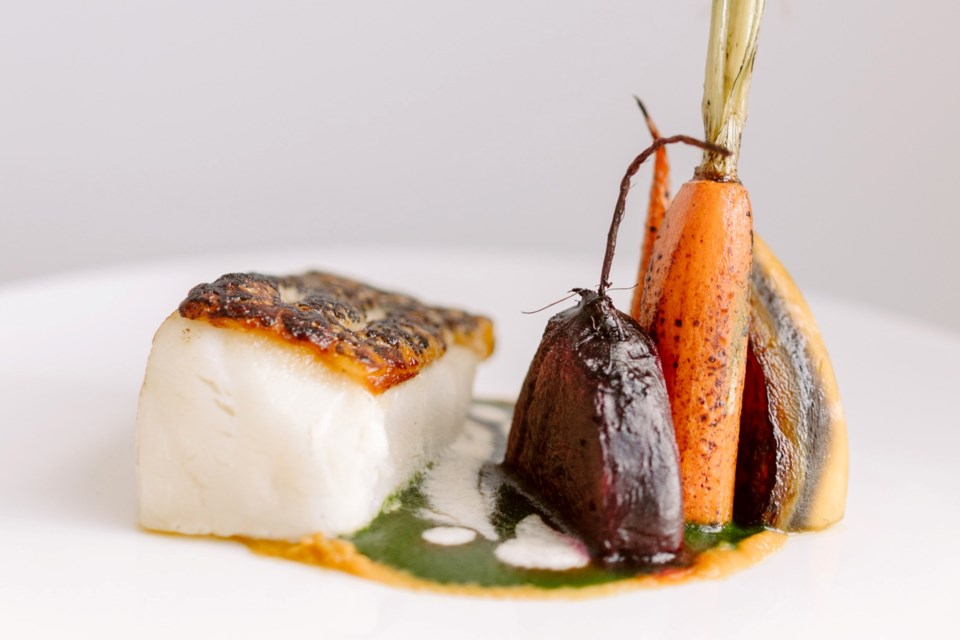 Boy Gorgeous works with a number of photographers to do food styling and food photography. This picture by Cristina Velasco Photography features Chilean sea bass, heirloom root vegetables, green garlic puree, smoked tomato gel and white truffle foam. 