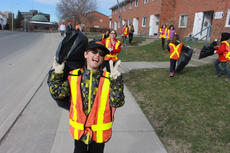 Zaven Prevost, 10, helped with the Louis Street Association’s annual neighbourhood clean-up Saturday morning. Photo by Jonathan Migneault. 