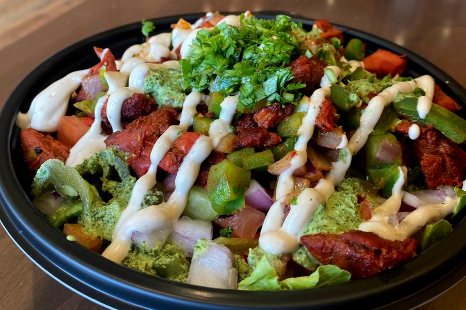 The Chicken Tikka Salad bowl is a favourite amid the three owners and many customers.  It features cucumbers, Indian spices like masala, mint and chicken. 