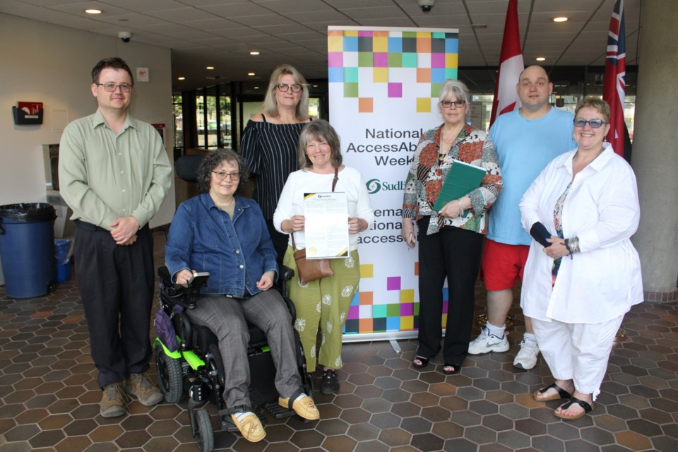 Greater Sudbury Accessibility Advisory Panel panel members pose for a photo following Tuesday’s proclamation at Tom Davies Square. From left is Travis Morgan, Lisa Michelutti Mirabelli, Gina Kennedy, Patti Kitler, Ward 12 Coun. Joscelyne Landry-Altmann, Charles Tossell, and Sheila Bianconi. 