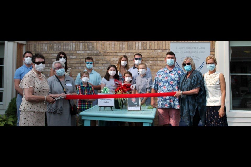 Members of the Ashcroft family gather with a representative of the Sisters of St. Joseph during the recent garden renaming ceremony. From left in the front row are Margaret Ashcroft, Sr. Bonnie McLellan, the General Superior of the Sisters of St. Joseph of Sault Ste., and Askcroft family members Marie, Jonah, Mallory, Sloane, Evie and Mark Ashcroft, as well as St. Joseph’s Foundation Chair Celia Teale, and St. Joseph’s CEO Jo-Anne Palkovits. In the back (from left) are  Andrew, Annie, Jake, Jennifer and Brendan Ashcroft.