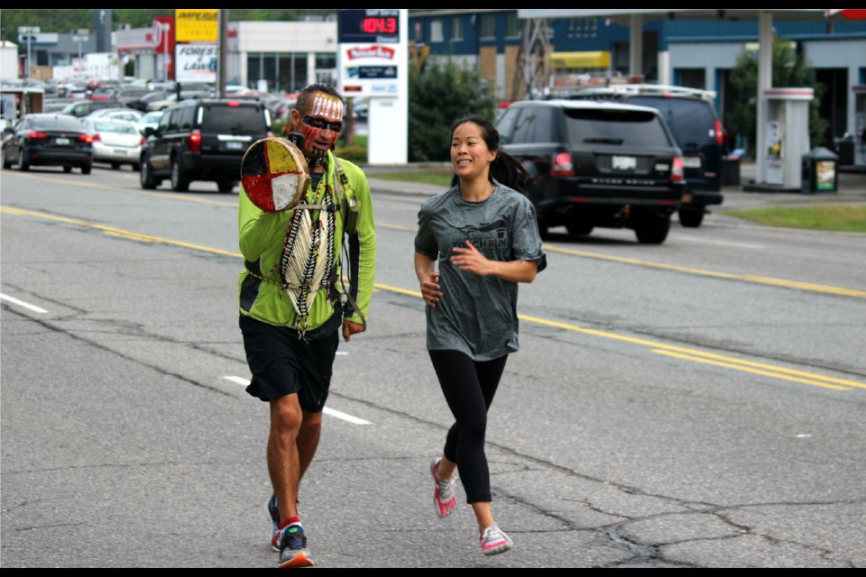 Tuesday morning, members of the Greater Sudbury Police Service went for a five-kilometre run with Caribou Legs, a First Nations man running across Canada to raise awareness about missing and murdered aboriginal women. Darren MacDonald photos.