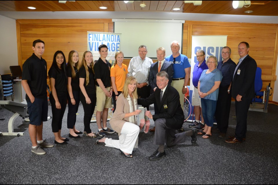 Finlandia Village board members, staff and guests pose for a photo after a press conference announcing the first Sudbury Strides for SISU walkathon, which is scheduled for Sept. 24. Photo by Arron Pickard.