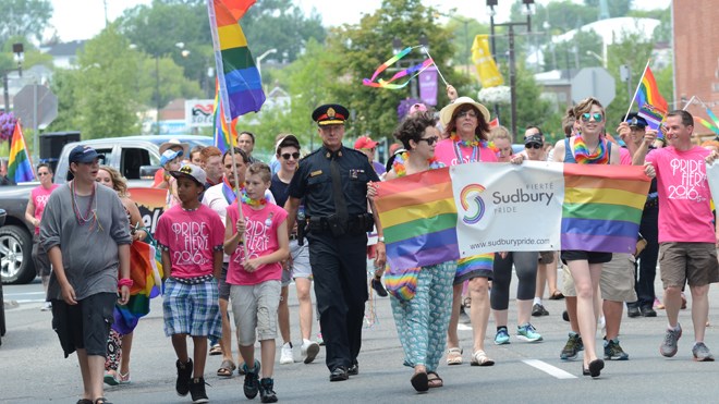 Hundreds of people showed off their pride during parade through downtown as part of the Sudbury Pride Week celebration. Photo by Arron Pickard.