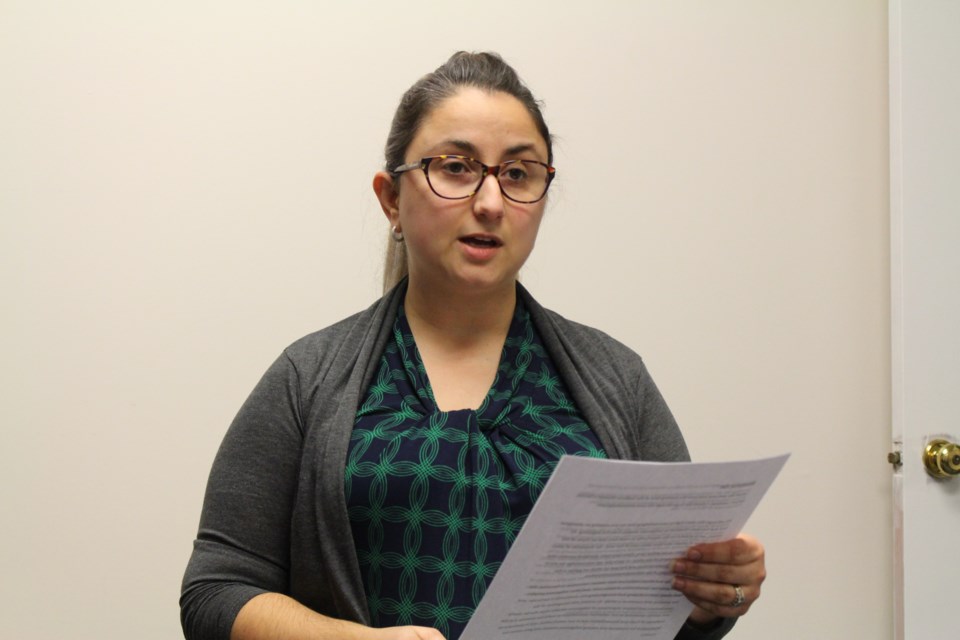 Sudbury Women's Centre executive director Giulia Carpenter speaks at a Dec. 6 vigil marking the École Polytechnique massacre. (Matt Durnan/Sudbury.com)