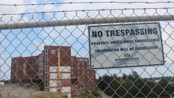 Taken earlier this summer, this is the “before” photo of the derelict former hospital site on Paris Street. (File)