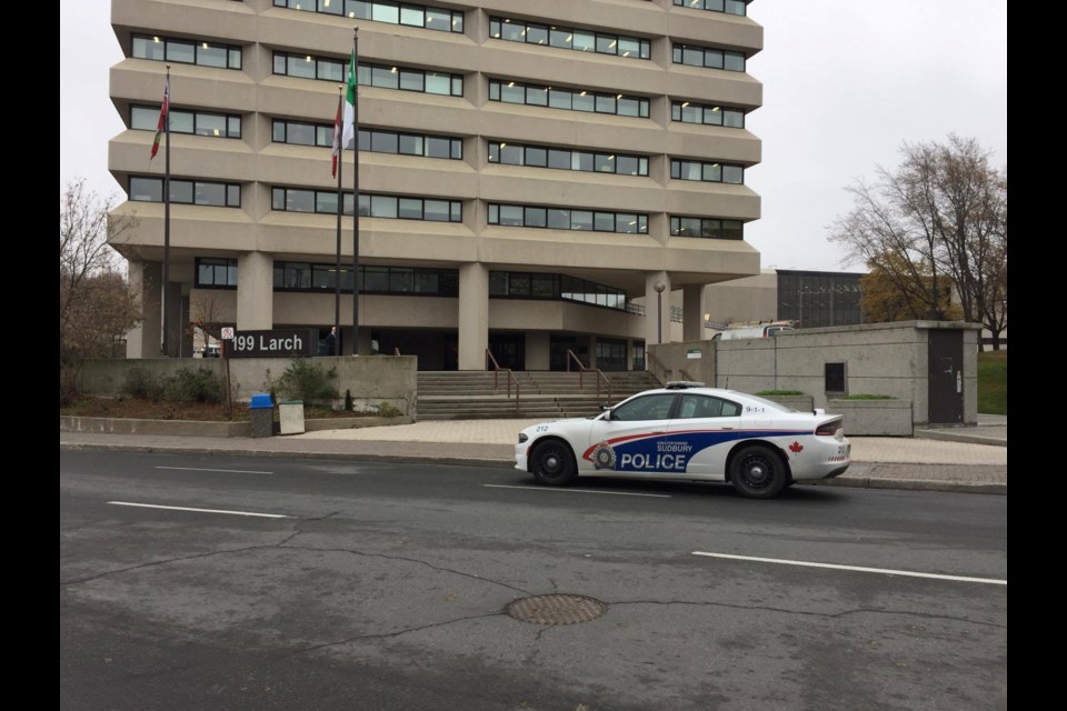 A Greater Sudbury Police cruiser sits outside the provincial building on Larch Street, next to Tom Davies Square. This is where the "suspicious package" may have been found. Photo by Heather Green-Oliver