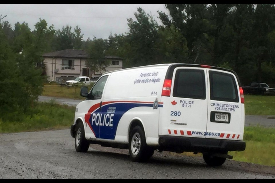 The GSPS forensic unit (as seen in this 2016 file photo) were called to the scene at Fairbanks Lake Road after a walker located a body in the woods. (File)