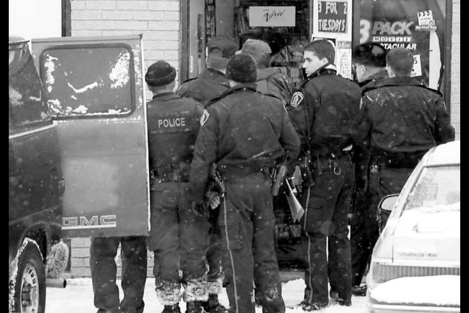 Police block the entrance to Adults Only Video at 1500 Paris, the morning of Renée Sweeney's murder in 1998. (File)