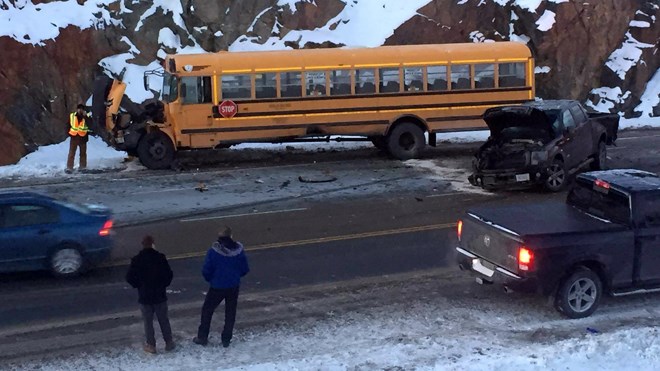 A crash on Big Nickel Mine Road between a school bus and a pickup truck has restricted the road to a single lane. Police and fire are on scene. Photo: Matt Durnan