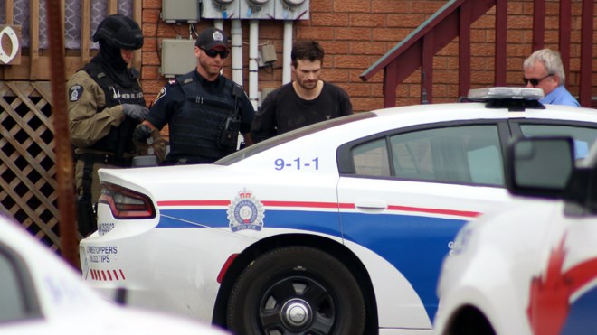 A standoff between Greater Sudbury Police and a man who refused to leave an apartment on Wilma Street in the Flour Mill ended peacefully this afternoon.  (Arron Pickard/Sudbury.com)