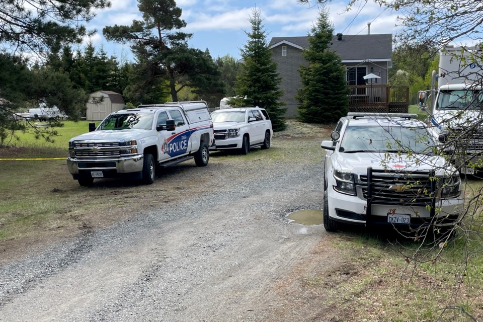Greater Sudbury Police vehicles on the scene in Hanmer where officers are searching for a missing 37-year-old woman.