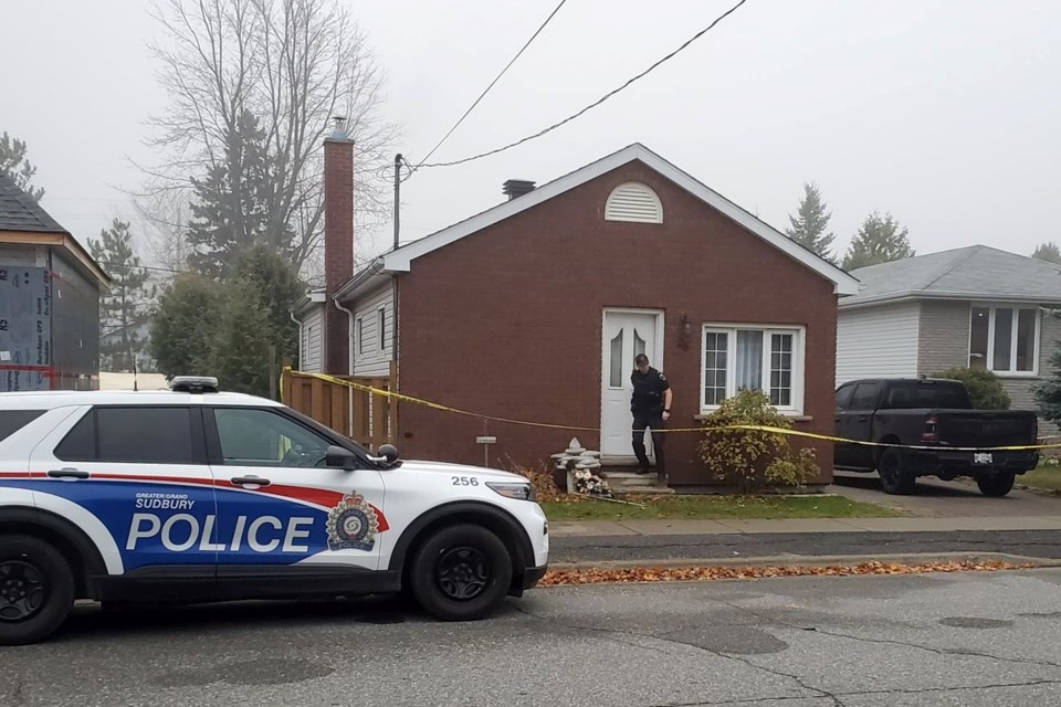 Greater Sudbury Police vehicles are parked outside a home at 25 Caruso Street in Coniston. On Oct. 30, police were dispatched to the home after receiving a call for service and discovered three people deceased in the home.