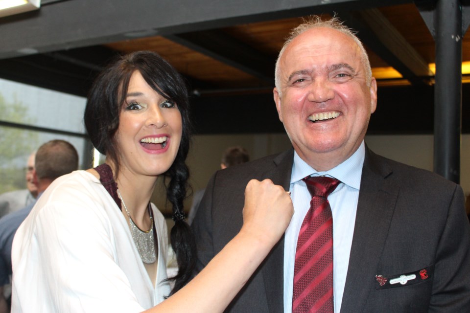 Amber Konikow and Mike Fabiilli share a laugh at the Greater Sudbury Sports Hall of Fame dinner on June 13 at the Caruso Club. (Allana McDougall/Sudbury.com)
