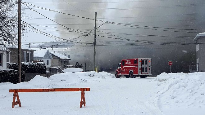 Emergency crews are battling a major structure fire near Notre Dame Avenue. The public is being asked to avoid the area around Whissell Avenue. Arron Pickard photo.
