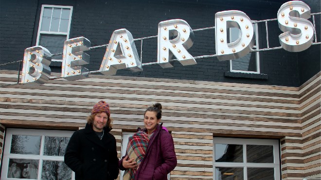 
Mark Browning and Jessica Nadel (with two-month-old Juniper) show off the exterior of their new Kathleen Street vegan cafe and bakery, Beards. Photo by Heidi Ulrichsen.