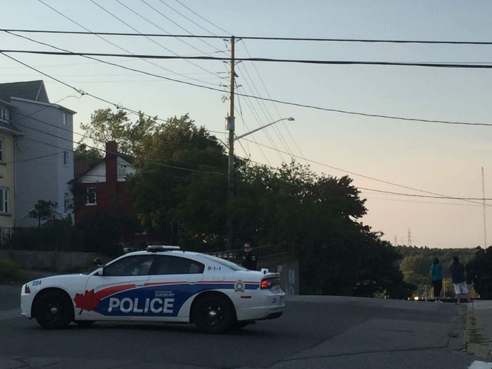 Police have blocked off Beatty Street from Frood Rd. to Pine Street. Photo by Matt Durnan