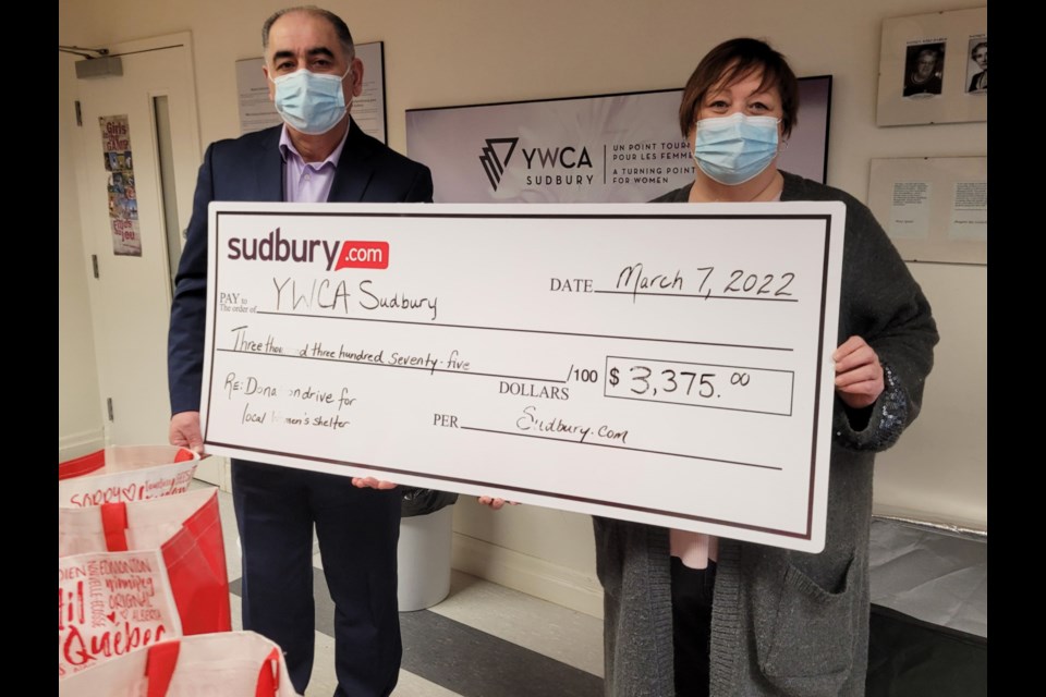 Sudbury.com Publisher, Abbas Homayed, delivers a cheque to Marlene Gorman, Executive Director, YWCA Sudbury .
