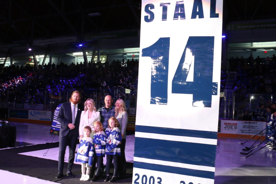 Marc Staal and his family watched as the banner for No. 14 was slowly raised to the rafters at the Sudbury Arena Friday night. (Len Gillis / Sudbury.Com)
