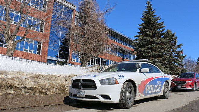 Greater Sudbury Police cruiser parked outside Collège Notre-Dame back in March while investigating a threat against staff and students made on social media. (File)
