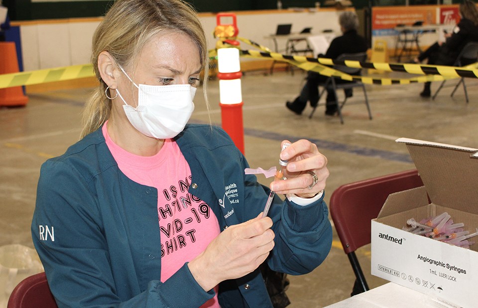 A nurse at a vaccine clinic in Sudbury prepares a Pfizer shot. File image