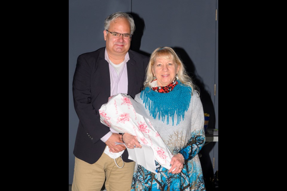New Sudbury Arts Council president Andrew Boyd thanks retiring president Linda Cartier.