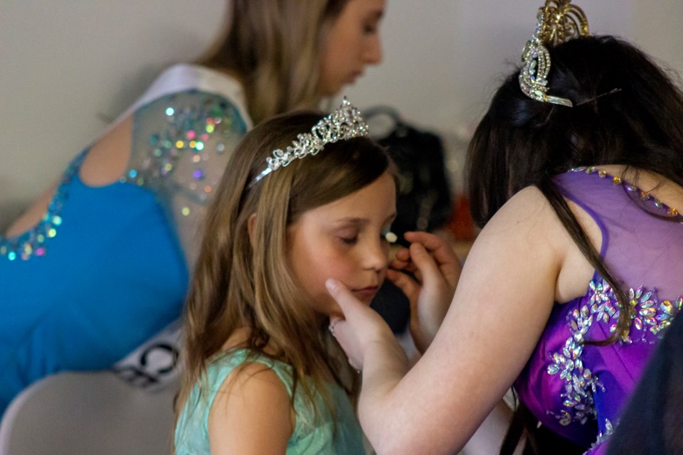 Dahlia Thomas sits as she gets pampered with a princess makeover at the Once Upon a Time Princess Ball as part of her royal castle experience. 