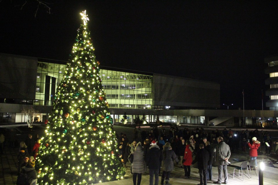 The “Merry and Bright” artificial tree outside of Tom Davies Square is now lit until early January.