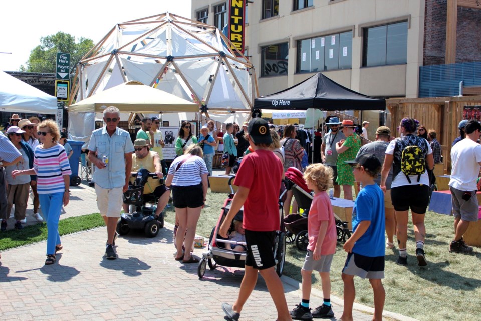 People of all ages are flocking to downtown Sudbury this weekend for the Up Here urban art and music festival, taking in family activities on Durham Street, listening to concerts and checking out several newly-painted murals.