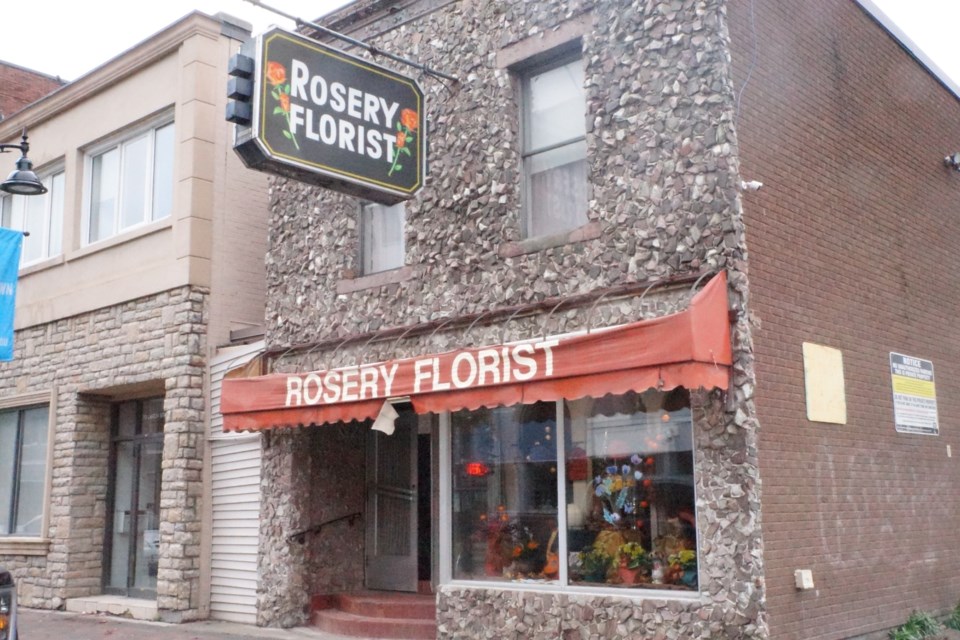 The Rosery Florist building at 74 Larch Street. Rosery Florist moved there from 78 Larch in 1948, ten years after they opened. Since 1950, Pat Ptaszynski has been working there and in 1970, she took over the business from the late owner, Bill Kramer. 