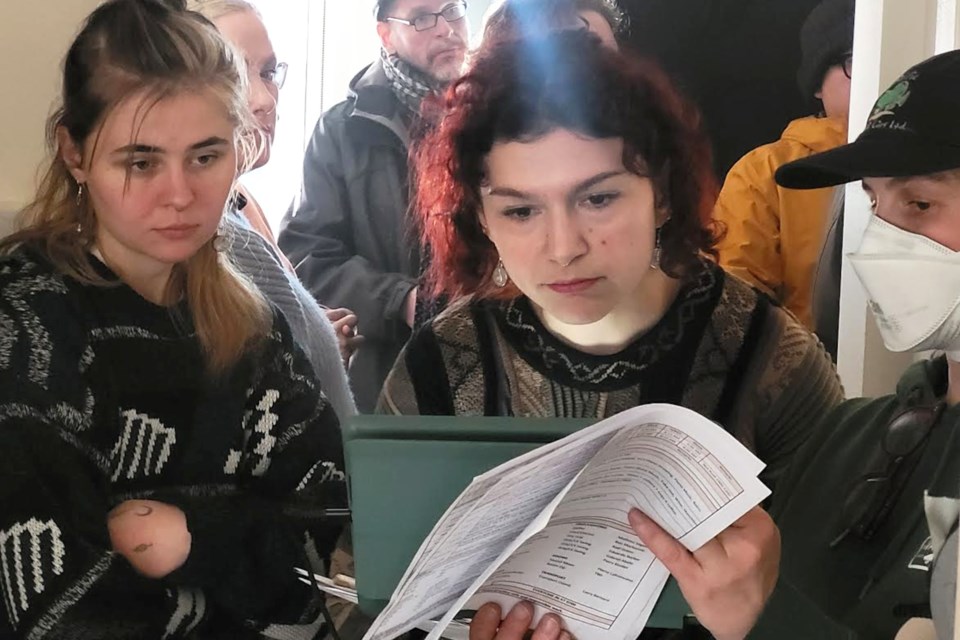 Writer/director Maryna Ohanesian looks over notes during the filming of a scene of her short film, “It’s March 17 and I’m Still In Love With You,” at a house on Bancroft Drive last weekend.