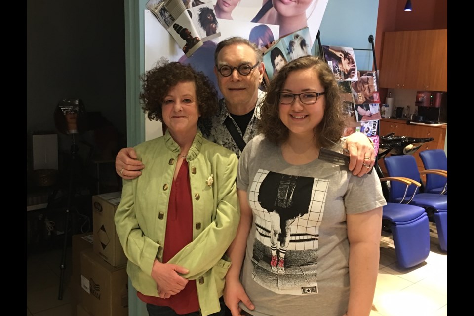 Hannah Bellmore and Stephanie Greco recently cut their hair and raised funds for the Northern Cancer Foundation. From left are Greco, Marasco and Frank Marasco. Supplied photo.
