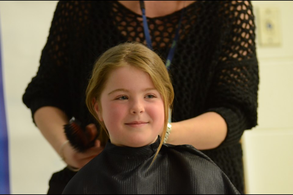 Immaculate Conception School student Julia Hayden turned eight today, and for her birthday, she cut her hair and donated it to make wigs for cancer patient. Photo by Arron Pickard.