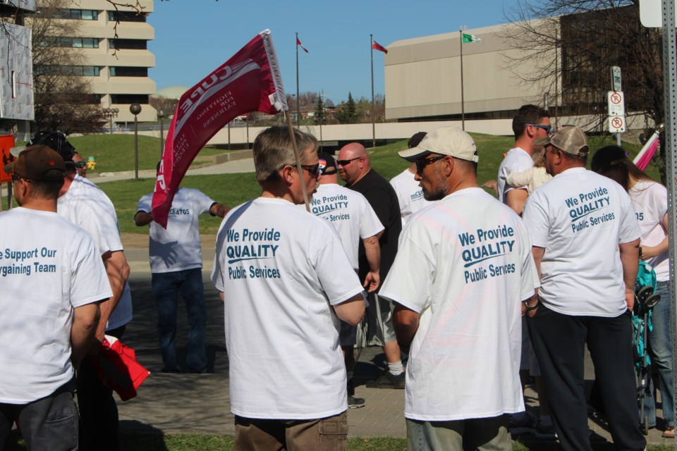 More than 70 city employees picketed at Tom Davies Square on May 10 in an effort to raise their concerns over the need for a new collective agreement for members of CUPE Local 4705. Photo: Matt Durnan