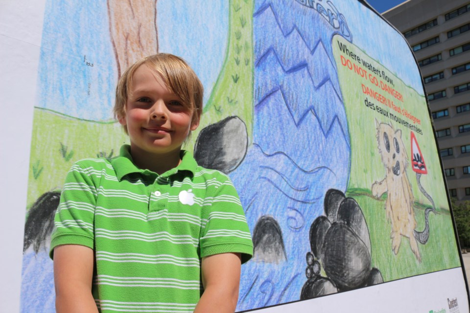 Bradley Kiviaho, a Grade 5 student at Walden Public School, was announced this year's first place winner in the Fast Flowing Water poster contest on June 9. He took home a $250 gift card from Best Buy and won another $1000 gift card for his school. Kiviaho's poster will be showcased on two billboards in Sudbury. Photo by Heather Green-Oliver.