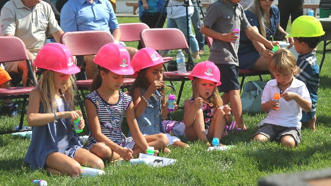 The family of brothers Cory and Kelly Morel were on hand Friday for the official groundbreaking ceremony of the splash pad being built at the Morel Family Foundation Park on Second Avenue. Darren MacDonald photo.