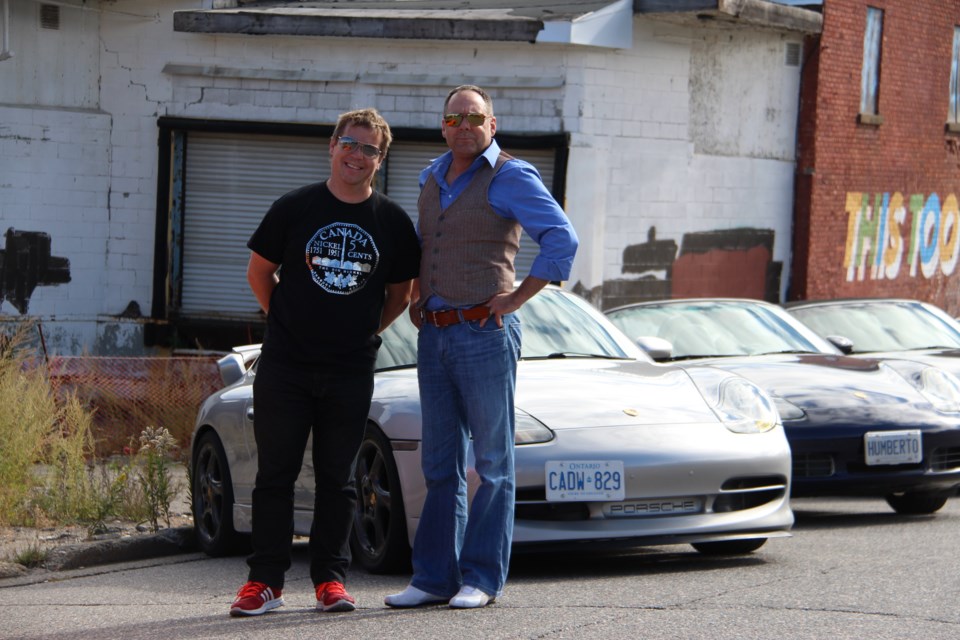 Greg Oldenburg and Guy Robineau outside of the Brewer Lofts during a Porsche Club tour of Sudbury. Photo: Matt Durnan