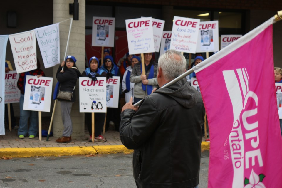 Dozens of CUPE members gathered in front of Sudbury MPP Glenn Thibeault's office on Nov. 2 to protest Health Sciences North's decision to move change their laundry service provider to a Hamilton-based company next April. Photo: Matt Durnan