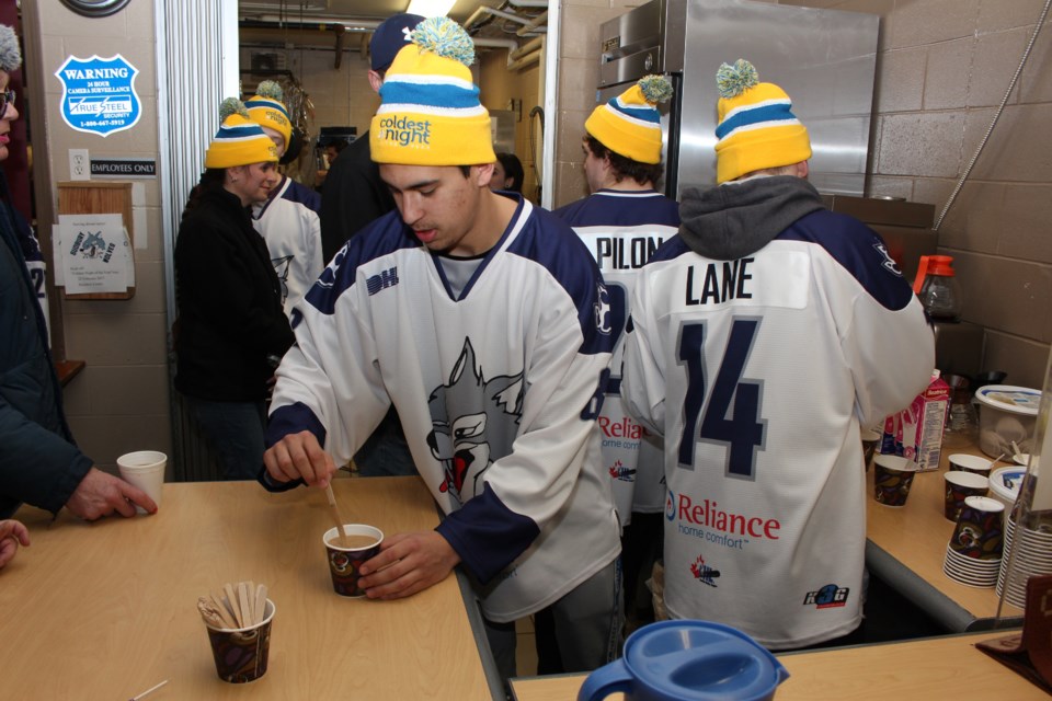 Members of the Sudbury Wolves helped kick off the fifth annual Coldest Night of the Year on Jan. 12 as the served up dinner and coffee for patrons of the Elgin Street Mission. Photo: Matt Durnan