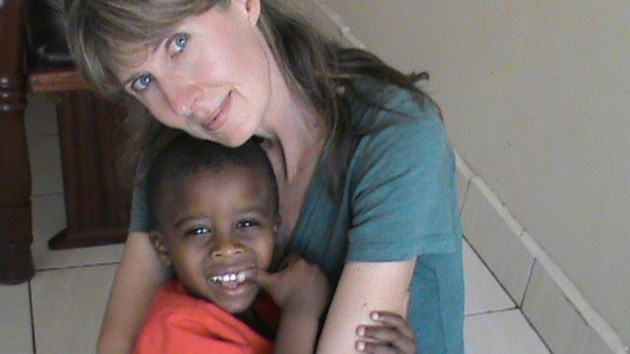 Suzanne Harvey (pictured in 2013 with Zawadi la Tumaini resident Johnito) and her family were moved by their time at the children's home run by Sudburian Jacqueline Villeneuve in Kenya. Harvey plans her fourth trip this year. Supplied photo.