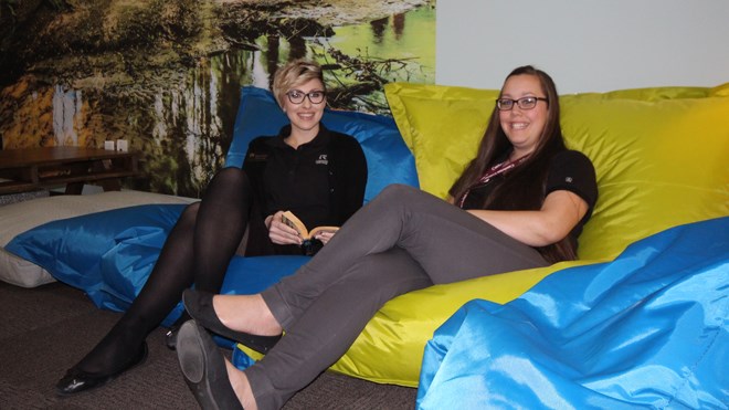 Cambrian College officially opened the Zen Den on Jan. 25. Librarian Marnie Seal and administrative assistant Natalie Guindon kick back on the den's beanbag chairs. Photo: Matt Durnan.