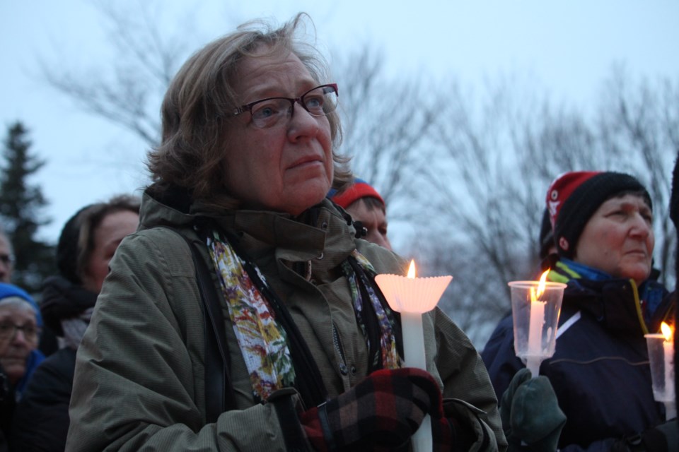 Memorial Park in the city's downtown was the site of a gathering of more than 100 people on Tuesday evening, as a candlelight vigil was held in solidarity with the victims of an attack at a Quebec City mosque. Photo: Arron Pickard