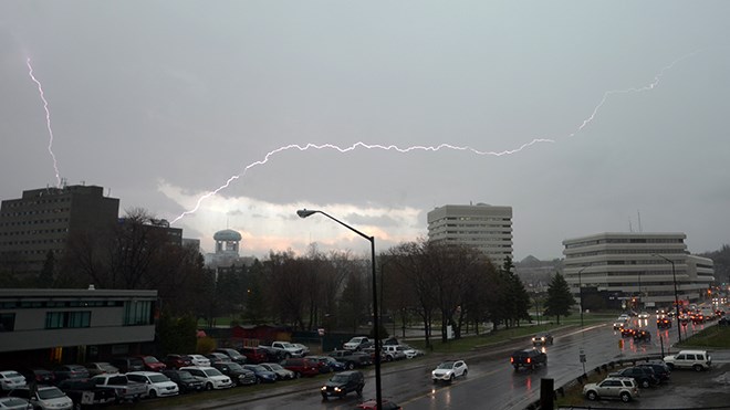 Lightning strikes over Downtown Sudbury as a thunderstorm hits at approximately 4:30 p.m. Thursday afternoon. (Arron Pickard/Sudbury.com)