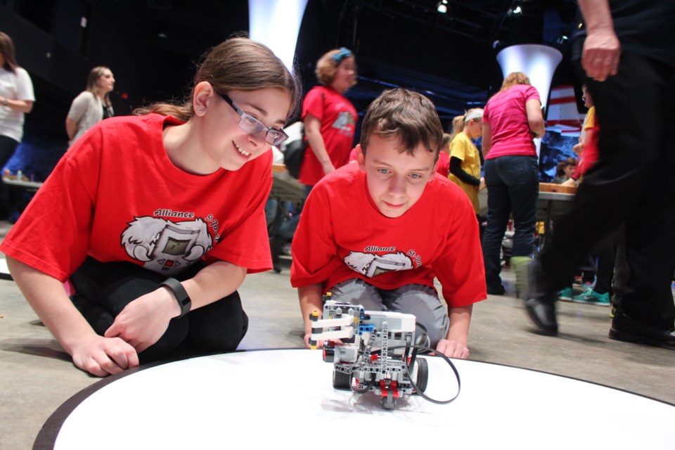 Grade 7 students from École Alliance St-Joseph, Chloé Roderigue (left) and Matthieu Lavallee, competed in the 2017 Great Robotic Challenge at the Science North Cavern on April 26. (Heather Green-Oliver/Sudbury.com)